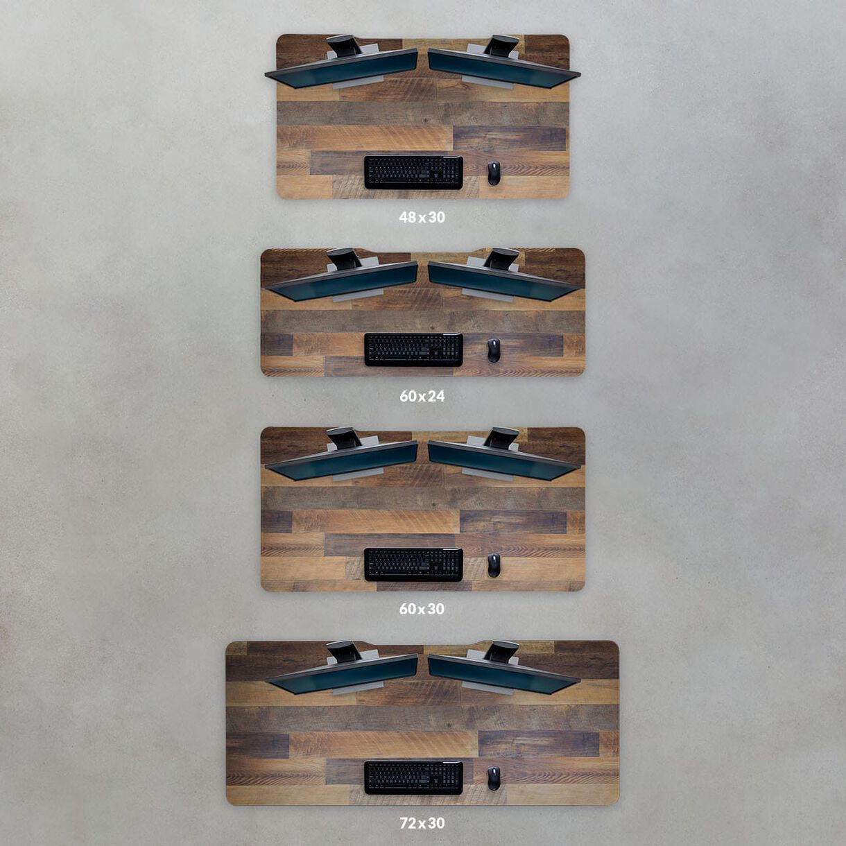 overhead view of four different size electric standing desks